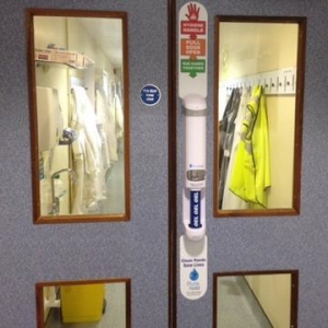 Purehold Pro Sanitising Gel Dispensing Door Handle in Use